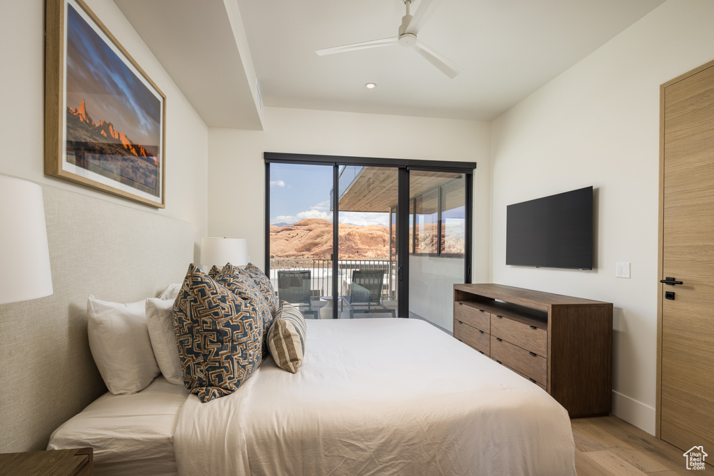 Bedroom featuring access to outside, light wood-type flooring, recessed lighting, and ceiling fan