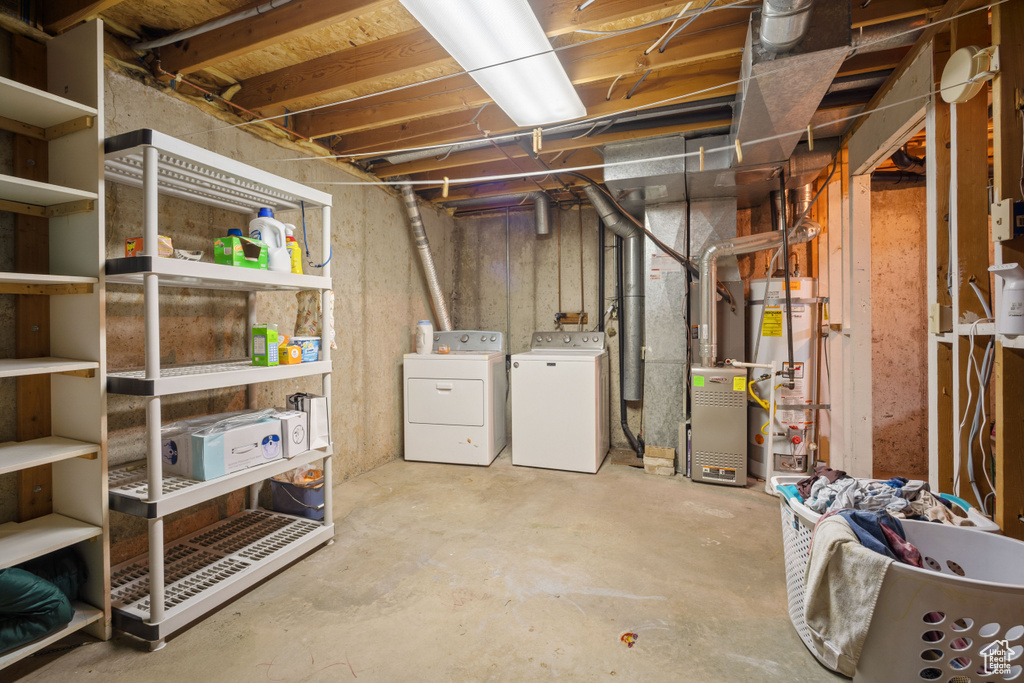 Basement with secured water heater and washer and dryer