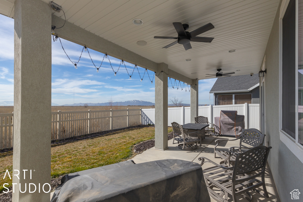 View of patio / terrace featuring ceiling fan