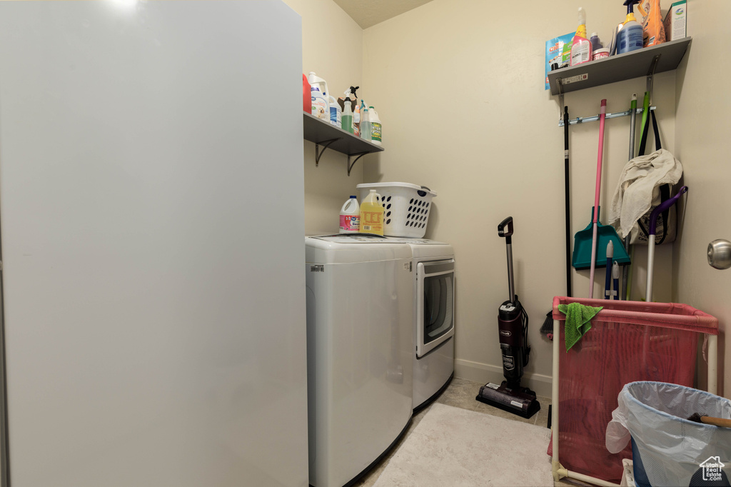 Laundry room featuring washing machine and dryer