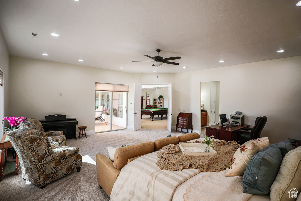 Living room with light carpet and ceiling fan