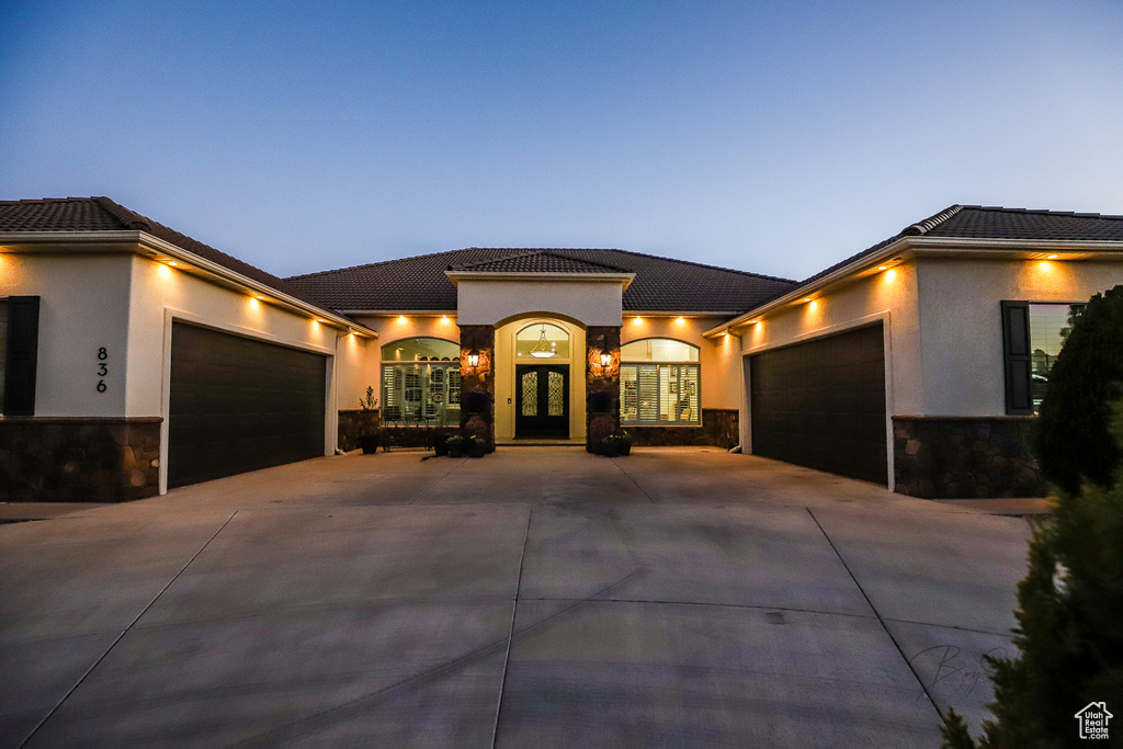 View of front of property with a garage