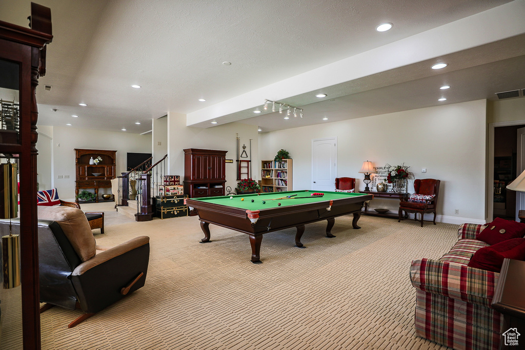 Game room featuring light carpet and pool table