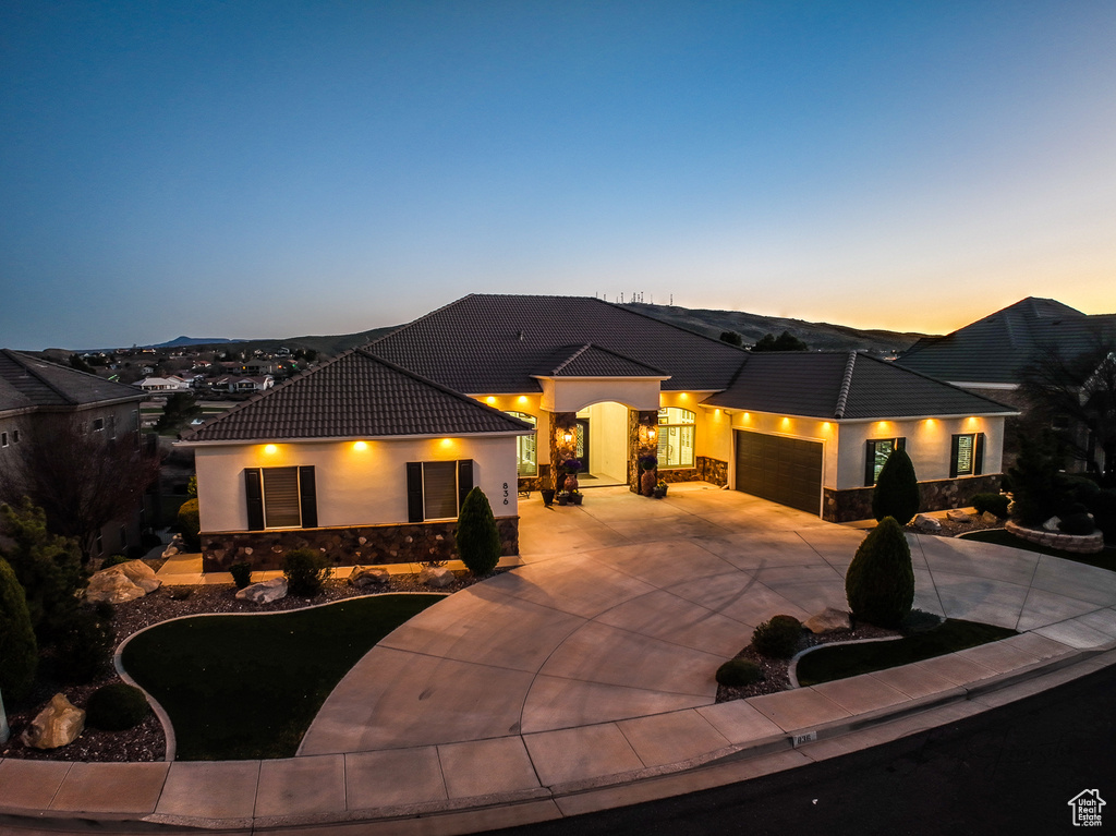 View of front of property featuring a garage