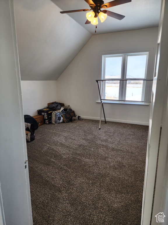 Bonus room featuring lofted ceiling, carpet flooring, and ceiling fan