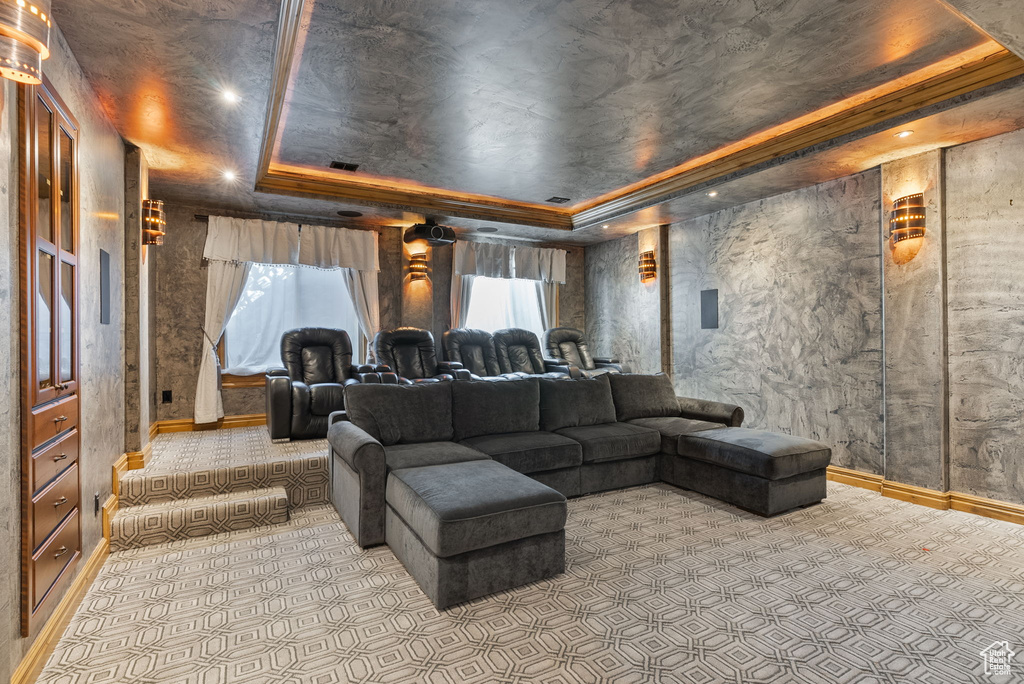 Tiled home theater with a tray ceiling