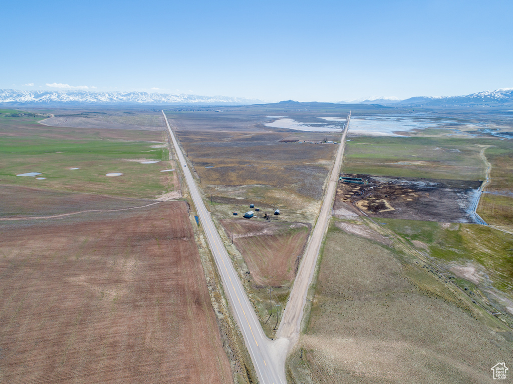 Aerial view featuring a rural view and a water view