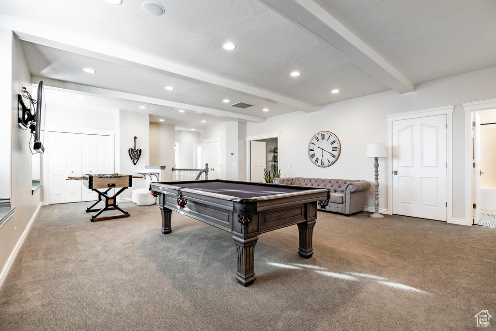 Playroom featuring pool table, carpet floors, and beamed ceiling