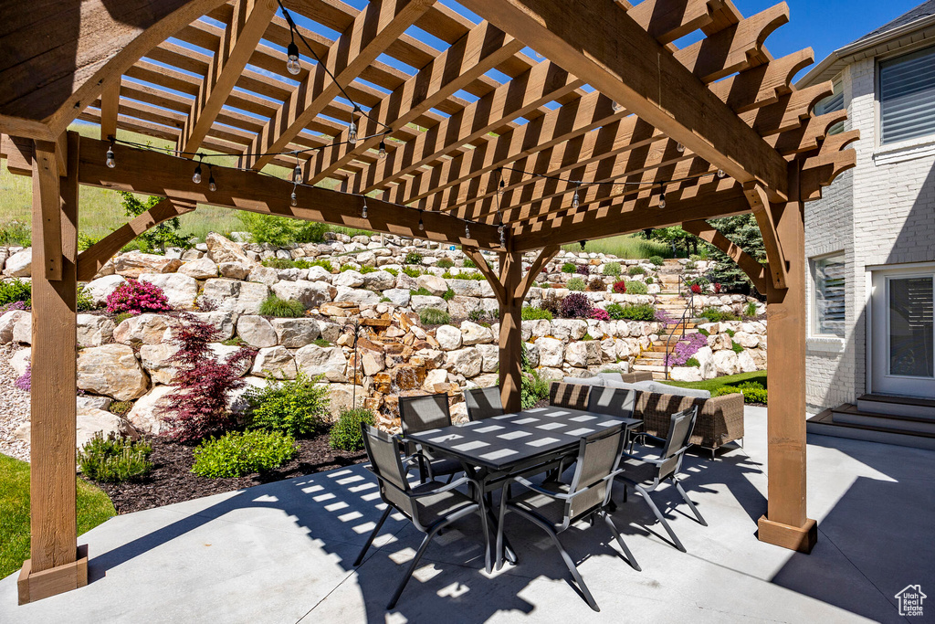 View of patio with a pergola