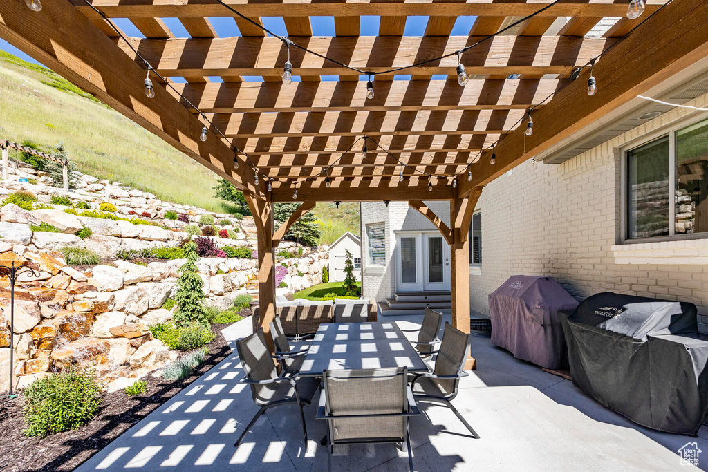 View of patio / terrace featuring a pergola