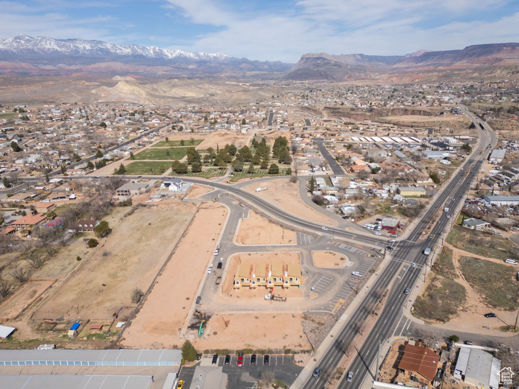 Birds eye view of property featuring a mountain view