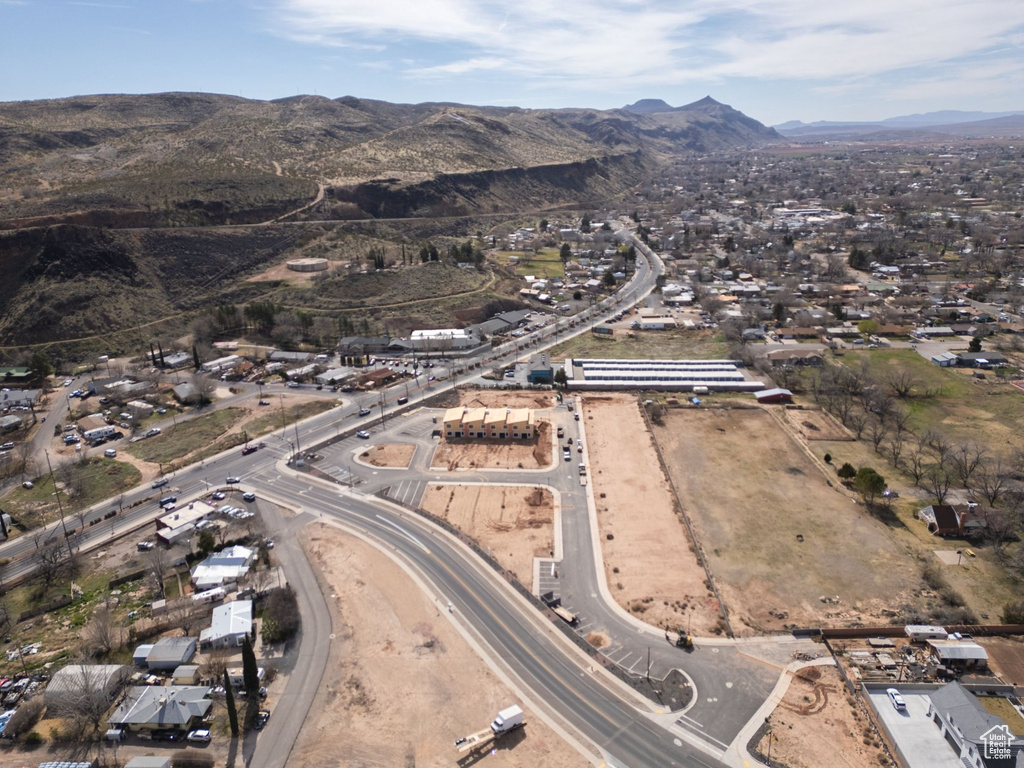 Birds eye view of property with a mountain view