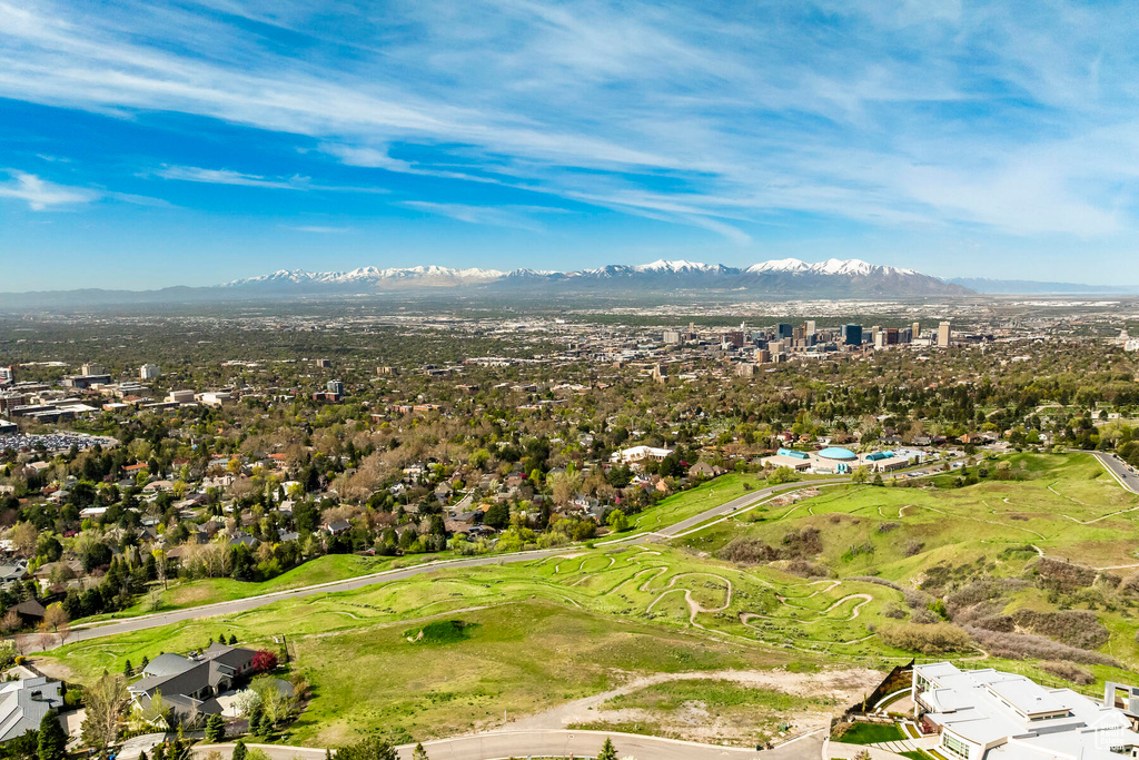 Birds eye view of property featuring a mountain view