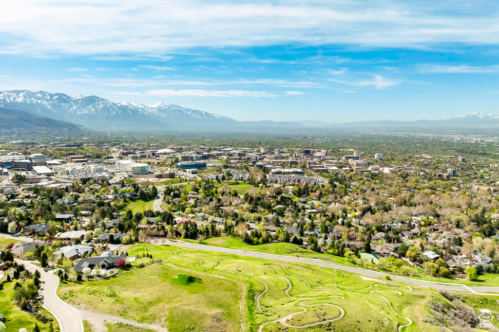 Birds eye view of property featuring a mountain view