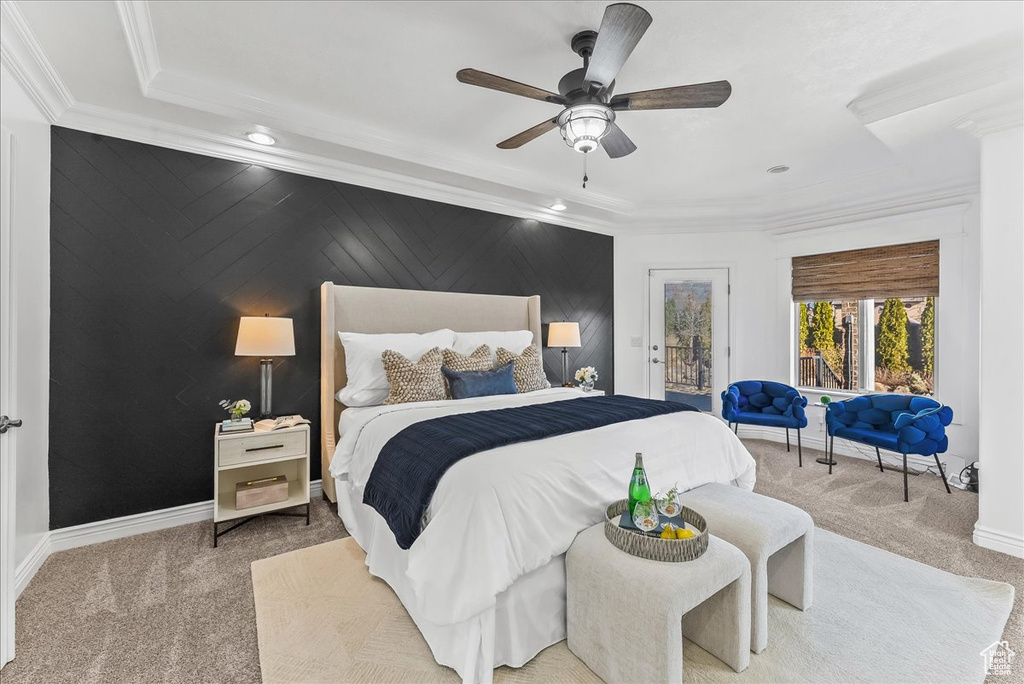 Bedroom featuring light colored carpet, crown molding, access to outside, and ceiling fan