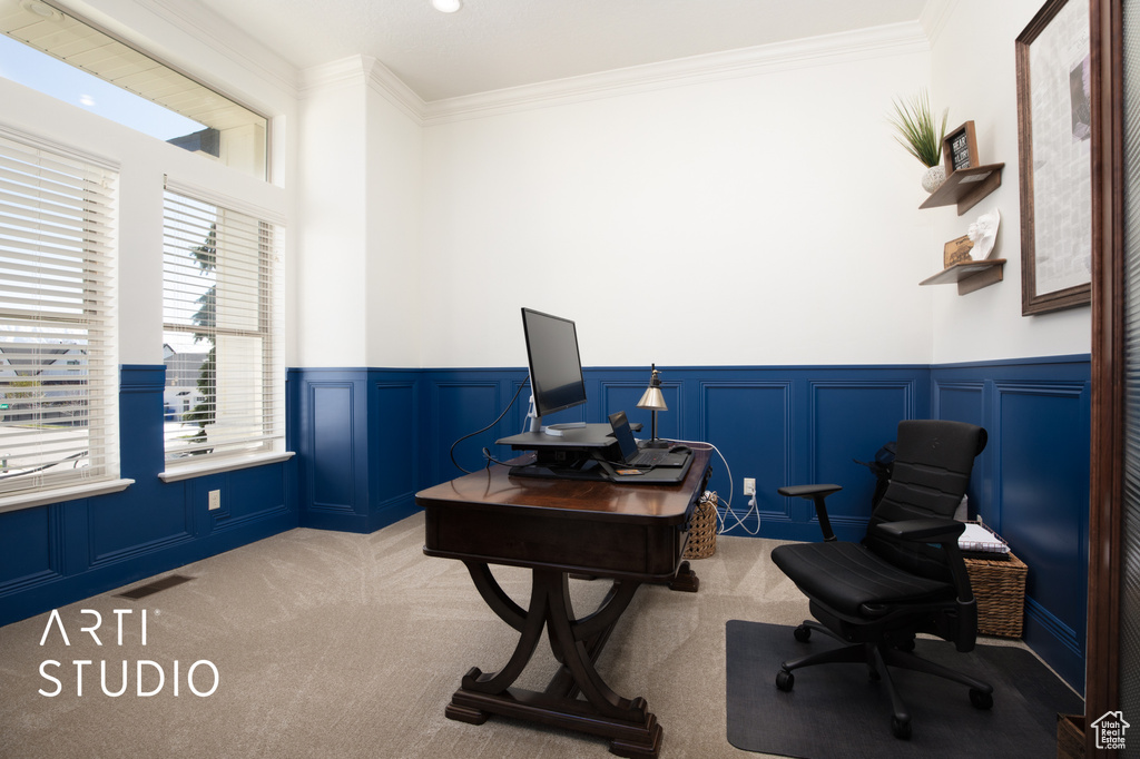 Carpeted office featuring ornamental molding