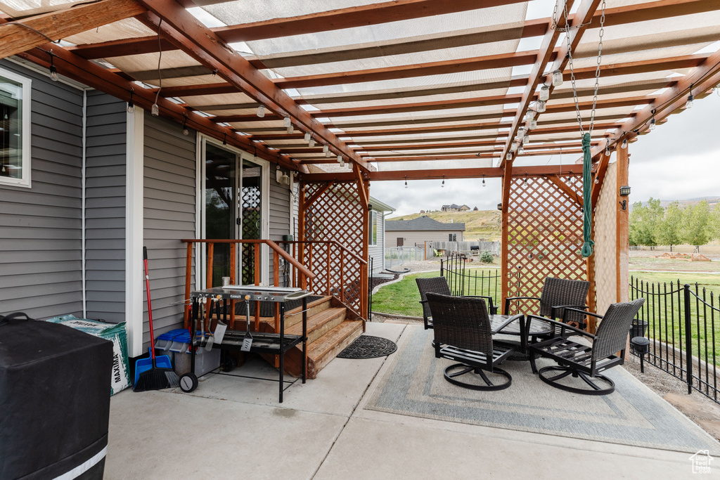View of patio / terrace featuring a pergola
