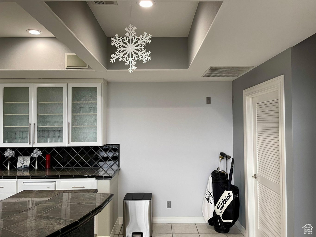 Interior space featuring light tile flooring