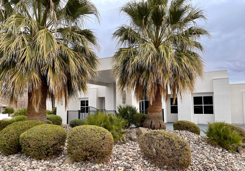 View of front of property with central AC unit