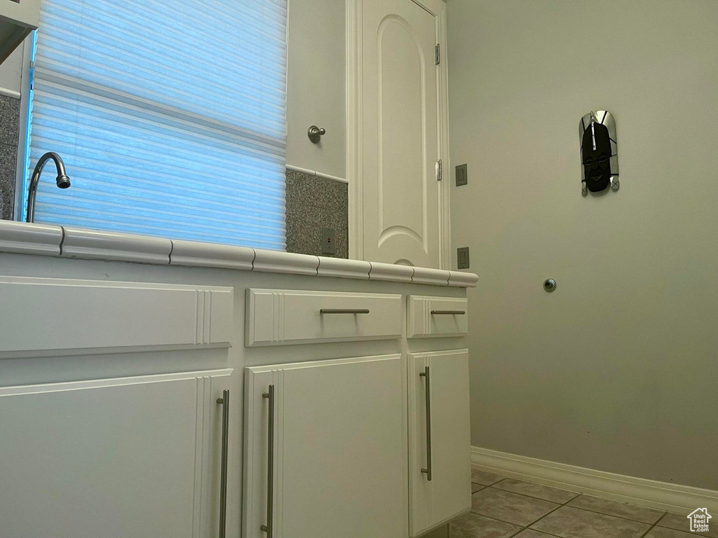 Bathroom featuring tile floors