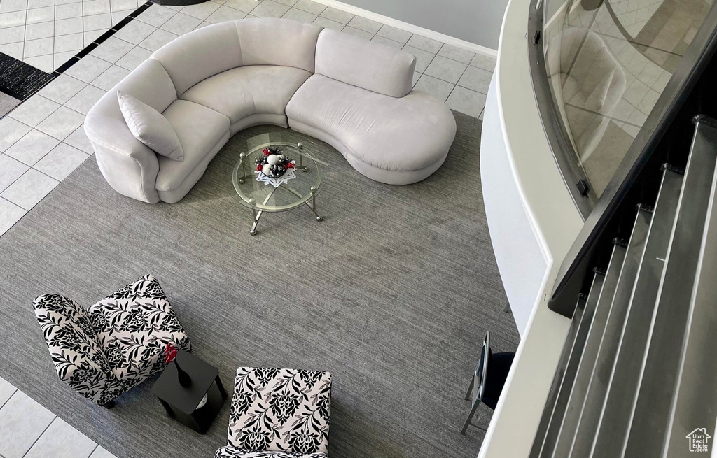 Living room featuring light tile flooring