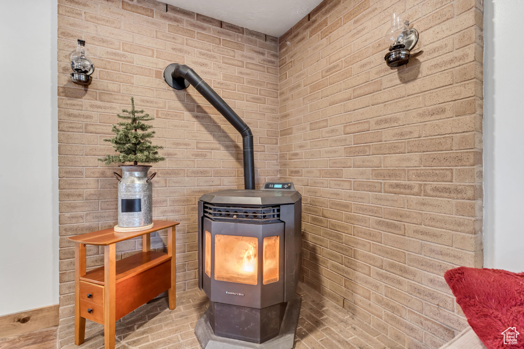 Room details with a wood stove