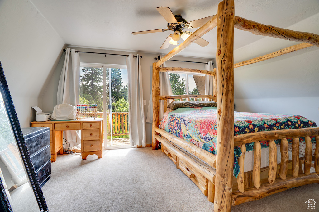 Carpeted bedroom with access to exterior and ceiling fan