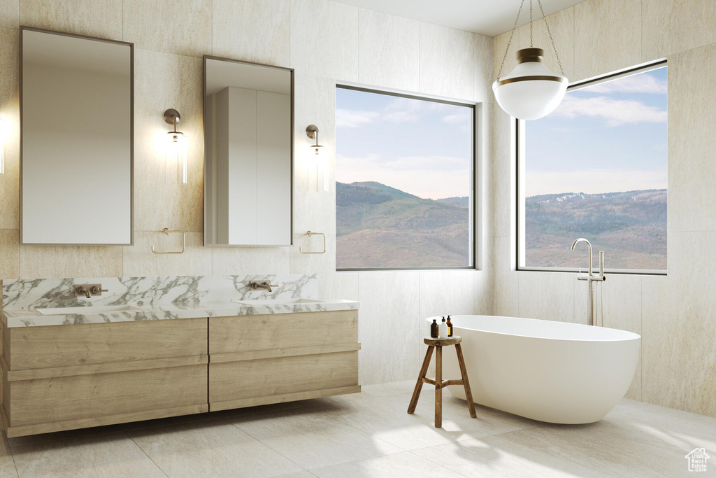 Bathroom featuring a wealth of natural light, a mountain view, and tile flooring