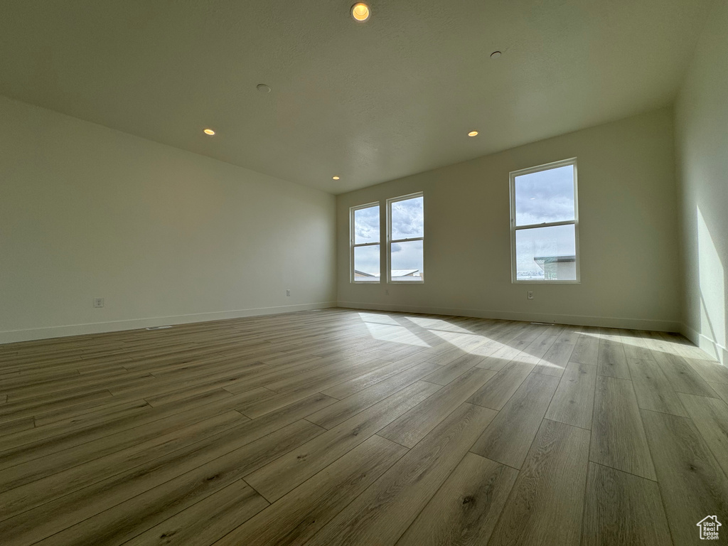 Spare room with light wood-type flooring