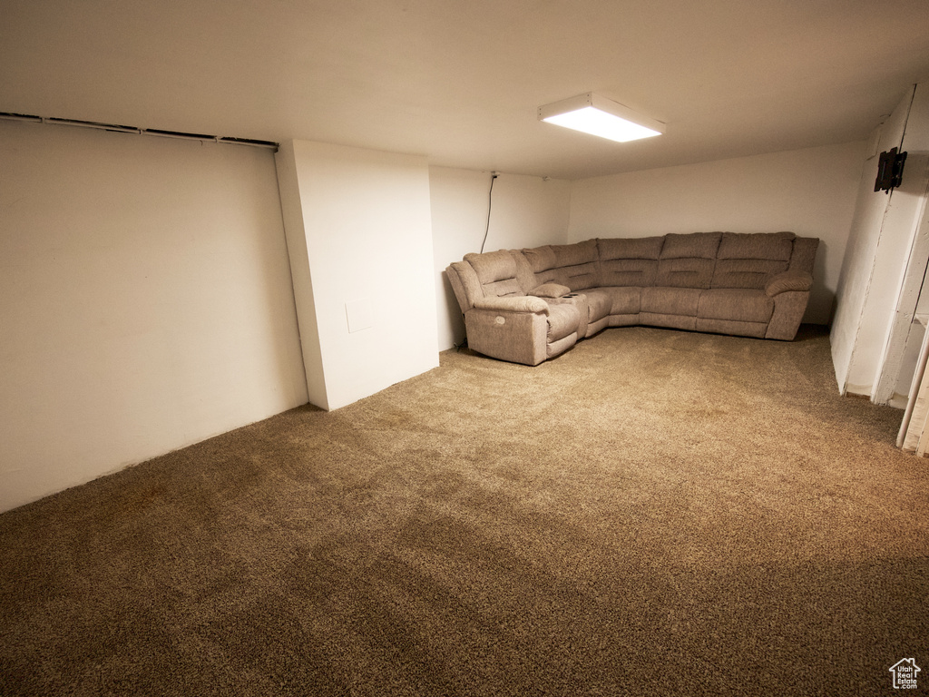 Unfurnished living room with carpet flooring
