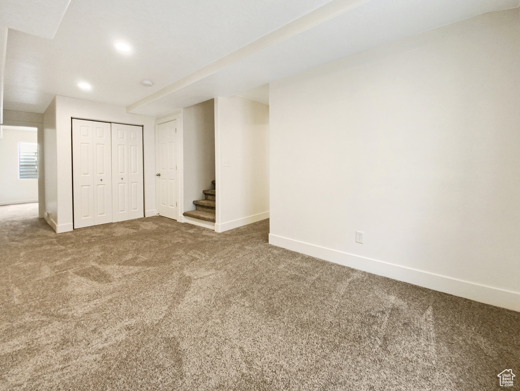 Interior space featuring dark carpet