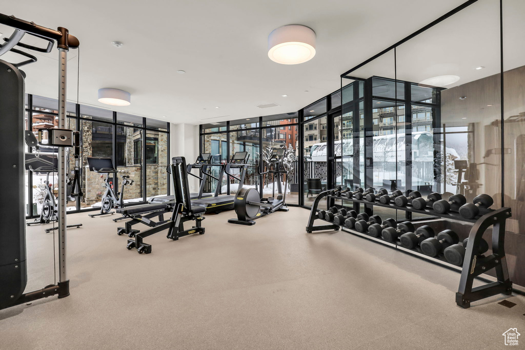 Exercise room with floor to ceiling windows