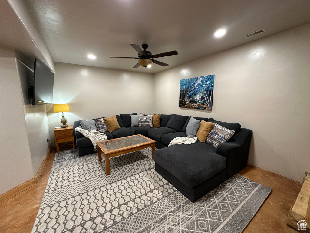 Living room featuring ceiling fan