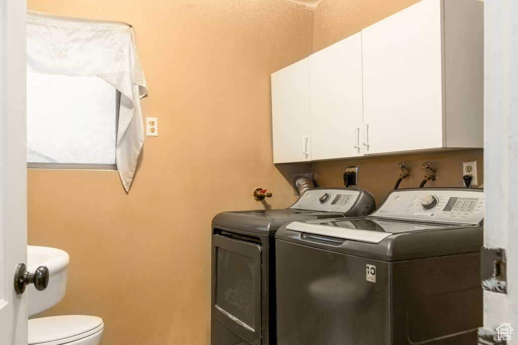 Washroom with independent washer and dryer, washer hookup, and hookup for an electric dryer