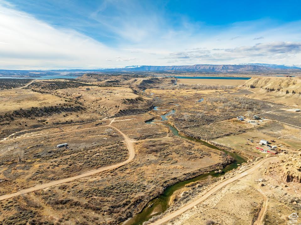 Bird\'s eye view featuring a water and mountain view