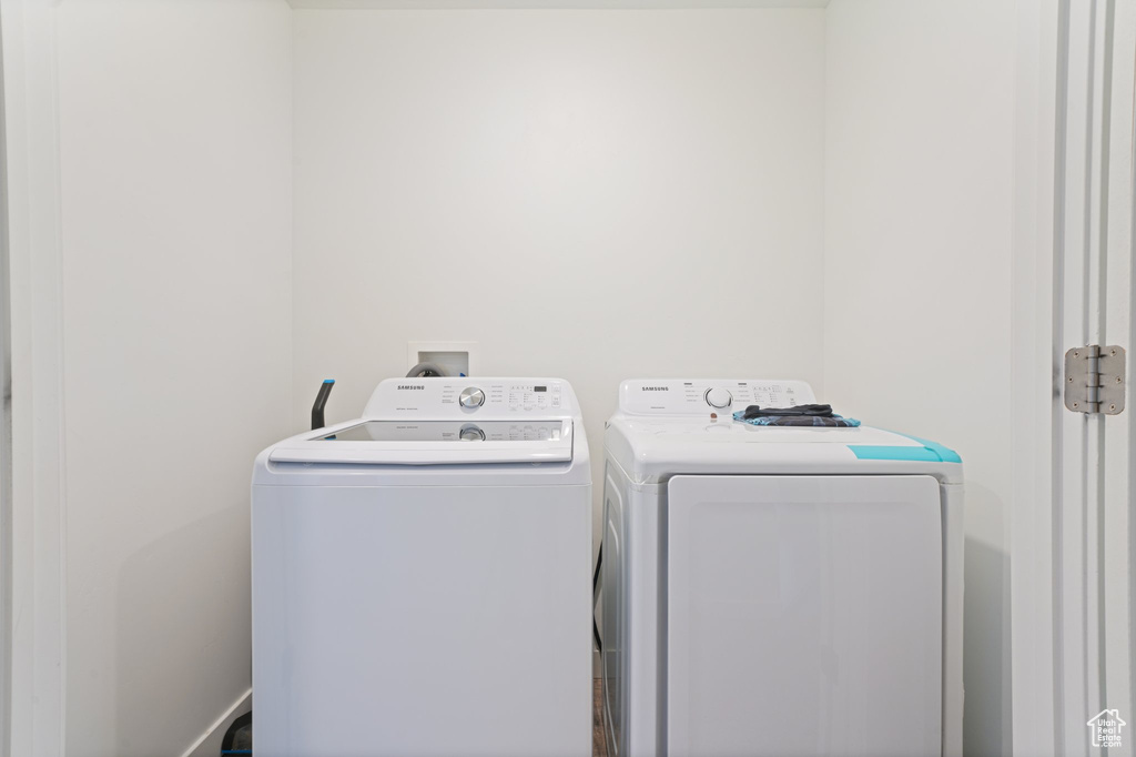 Clothes washing area with washing machine and dryer and hookup for a washing machine