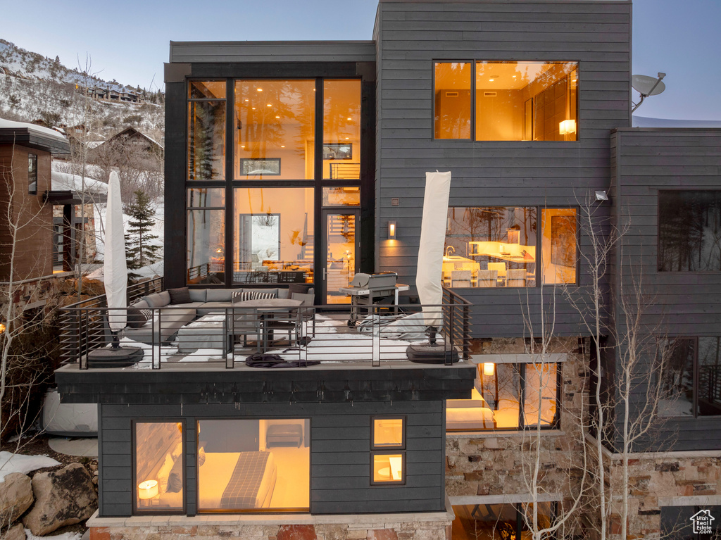 Exterior space featuring a mountain view and outdoor lounge area