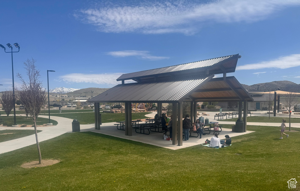 View of nearby features featuring a gazebo, a mountain view, and a lawn