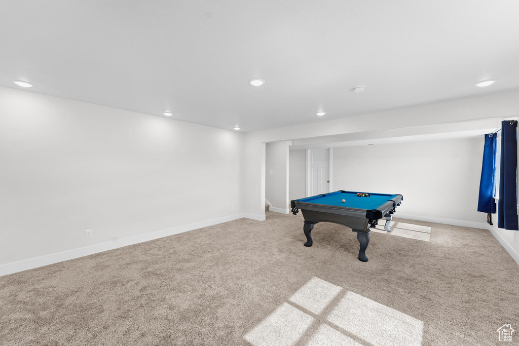 Recreation room featuring light colored carpet and pool table