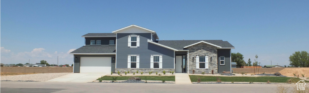 View of front of house featuring a garage