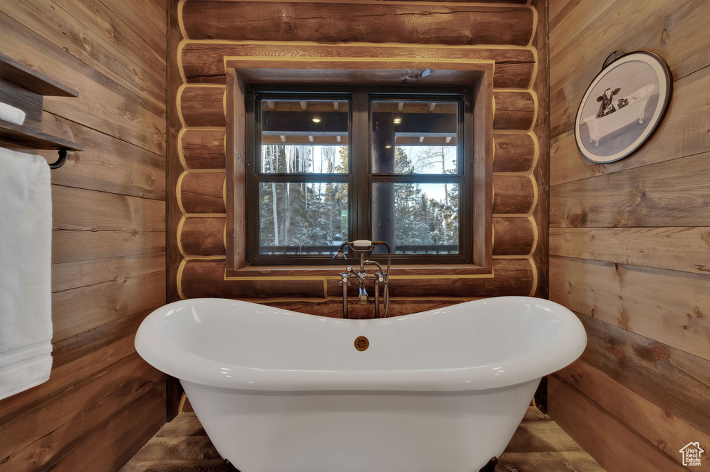 Bathroom with wood walls