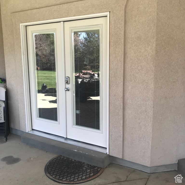 Property entrance with french doors
