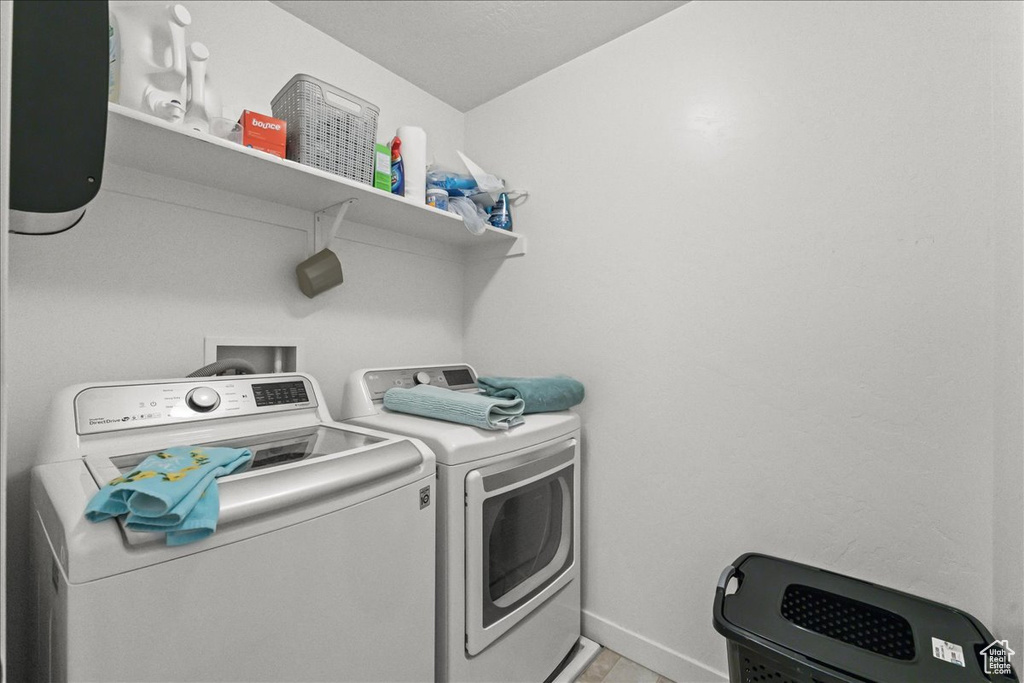 Laundry area with separate washer and dryer and washer hookup