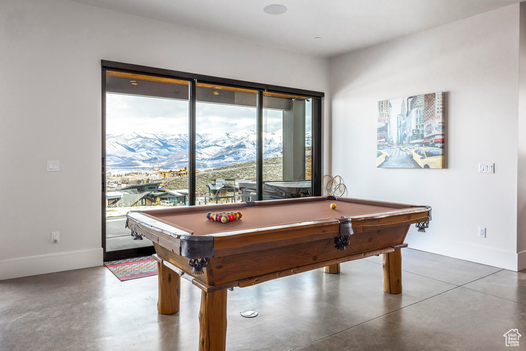 Rec room featuring a wealth of natural light, a mountain view, and pool table