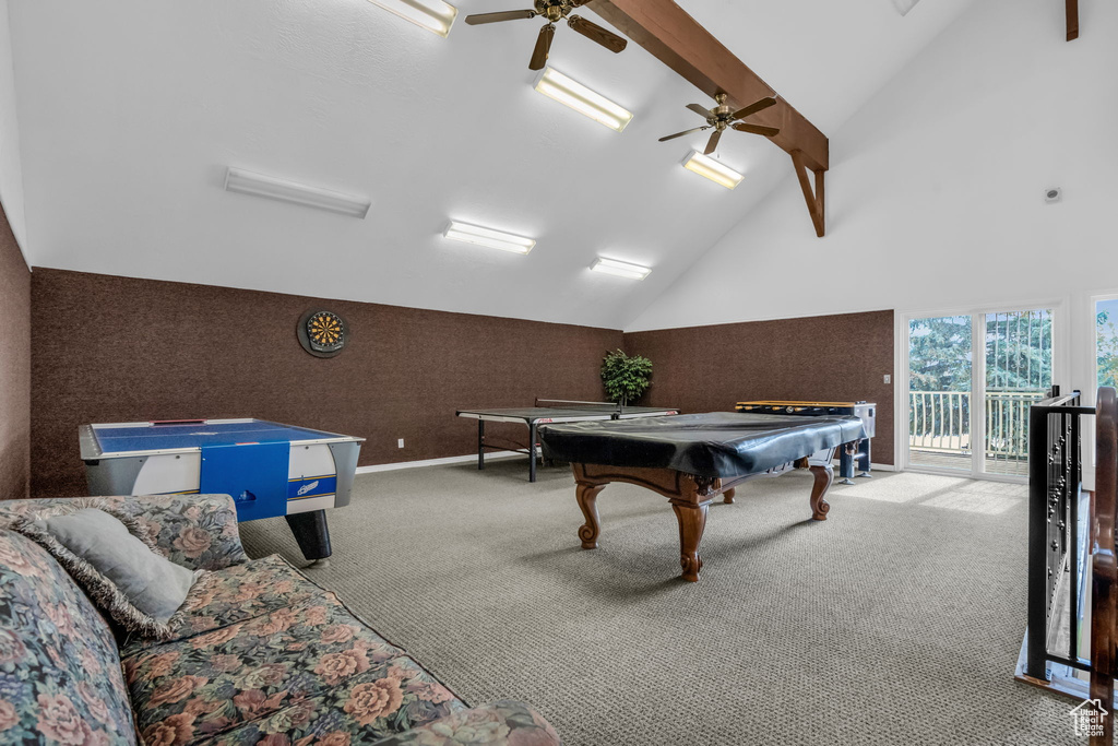 Rec room featuring light colored carpet, beamed ceiling, ceiling fan, high vaulted ceiling, and pool table