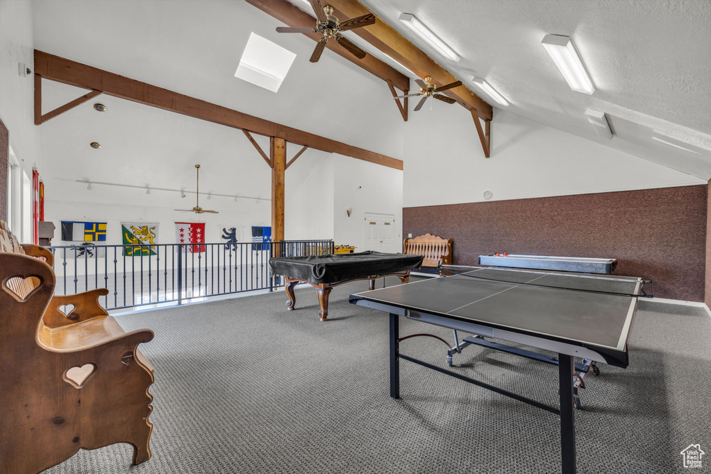 Rec room with high vaulted ceiling, carpet, beamed ceiling, pool table, and ceiling fan