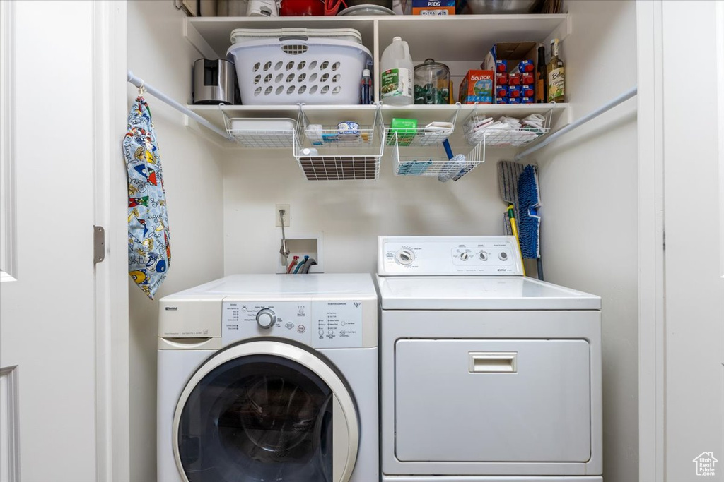 Laundry room with washing machine and dryer and hookup for a washing machine