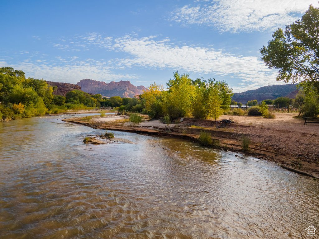 Property view of water with a mountain view