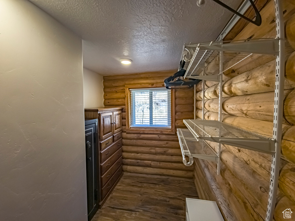 Interior space featuring dark hardwood / wood-style flooring