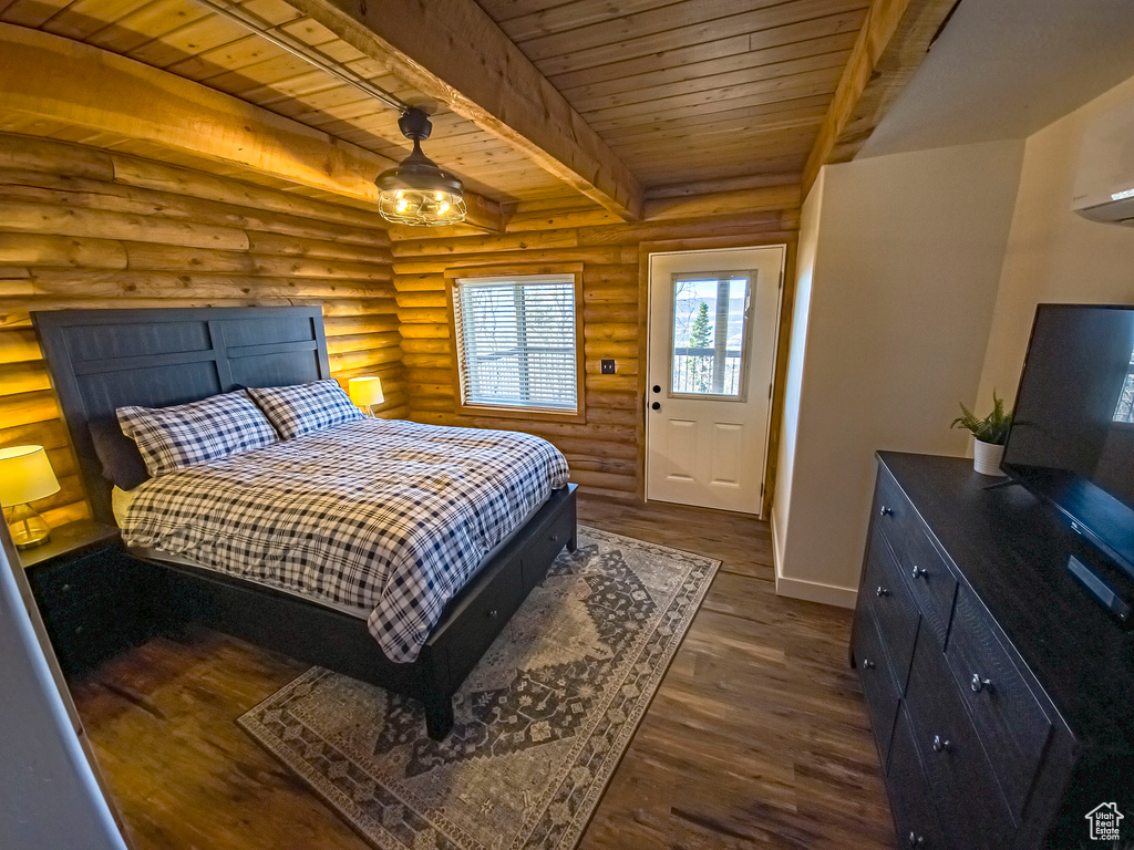 Bedroom with dark hardwood / wood-style flooring, ceiling fan, wooden ceiling, beam ceiling, and log walls